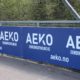 Aeko logo på fotballbane